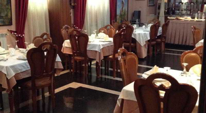 Art Hotel Nirvana Тирана Ресторант снимка
