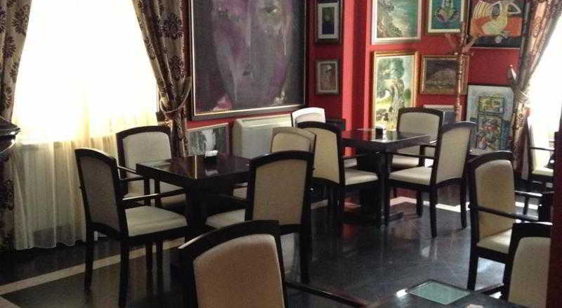 Art Hotel Nirvana Тирана Ресторант снимка